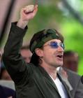 U2's Bono gestures to the students at Class Day ceremonies, where he was guest speaker at Harvard University in Cambridge, Mass., Wednesday, June 6, 2001. (AP Photo/Elise Amendola)