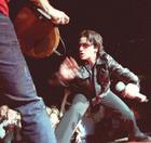 U2 frontman Bono playfully acts like a matador to guitarist The Edge (Darren Makowichuk, Calgary Sun).