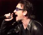 U2's lead singer, Bono, sings 