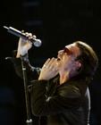 Lead singer Bono of the Irish rock group U2 performs at the Staples Center in Los Angeles April 6, 2005. U2 began their 'Vertigo' world tour in California. REUTERS/Lee Celano