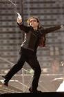 Bono, the lead singer for Irish rock band U2, throws water into the crowd during their concert at King Baudouin Stadium in Brussels, Friday June 10, 2005. U2 on Friday kicked of the first leg of their European 'Vertigo' tour in Brussels. (AP Photo/Geert Vanden Wijngaert)
