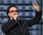 Bono, lead singer of Irish rock band U2 performs during a concert at the King Baudouin Stadium in Brussels June 10, 2005. U2 is currently on their 'Vertigo 2005' world tour with Brussels as the first concert in Europe. REUTERS/Stringer