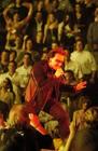 U2 singer Bono performs on the walkway during the first concert of their Vertigo Tour at the San Diego Sports Arena Monday, March 28, 2005. (AP Photo/Denis Poroy) 
