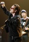 U2's Bono, left, and The Edge perform during the band's concert in Toronto, Monday Sept. 12, 2005. (AP Photo/Aaron Harris, CP)