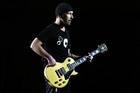 U2's The Edge performs during the band's concert in Toronto, Monday, Sept. 12, 2005. (AP PHOTO/CP, Aaron Harris)