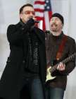 Bono (L) and The Edge of U2 perform 'In the Name of Love' during the We Are One: Inaugural Celebration at the Lincoln Memorial in Washington January 18, 2009. REUTERS/Jason Reed UNITED STATES)